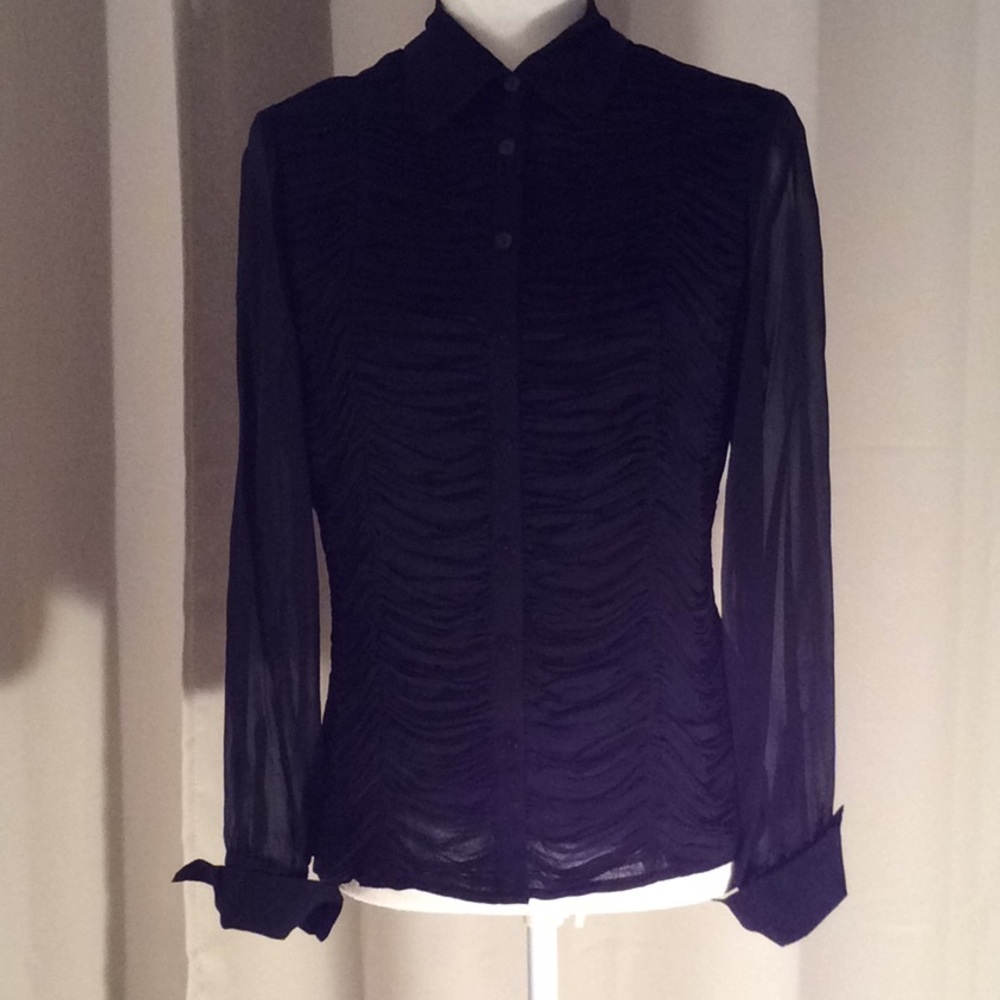 Elegant black ruffle front sheer back blouse.